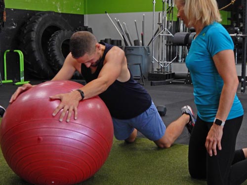 One on one personal training services by Katie Plunkett with client at Optimize You Personal Training & Fitness in Eagan, MN